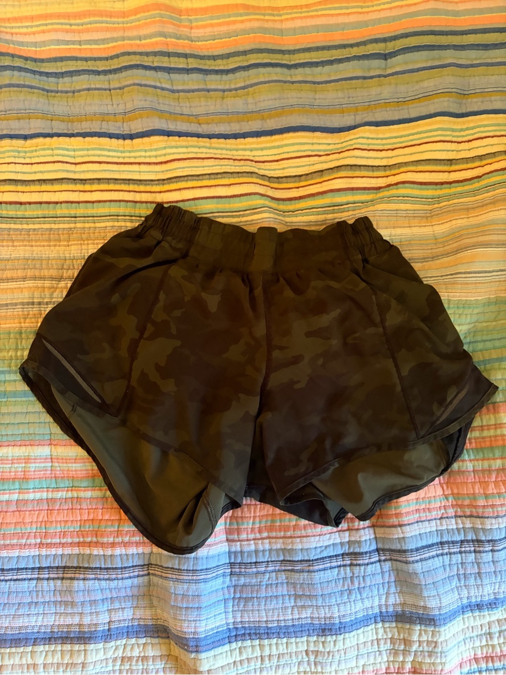 Green and black camouflage lululemon shorts